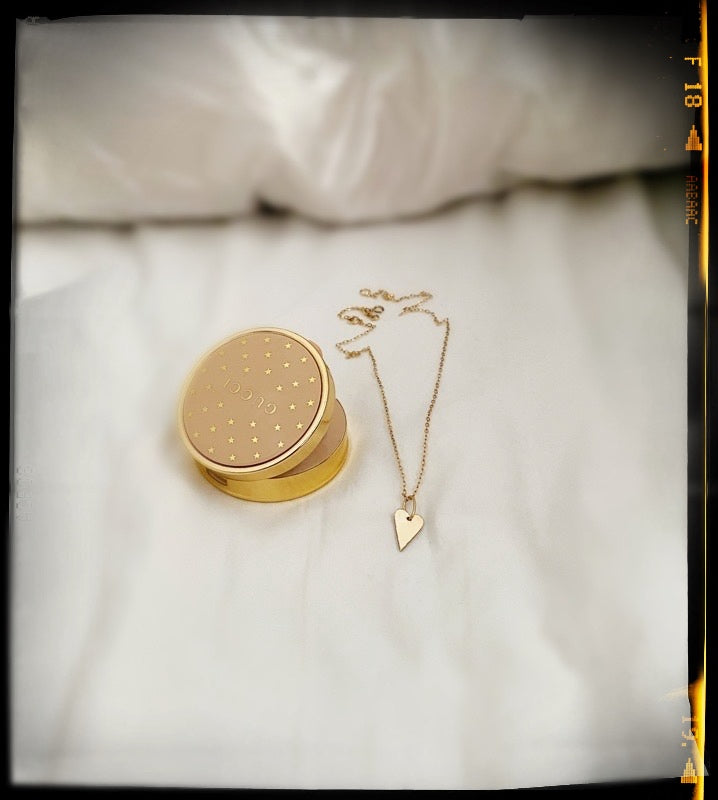 long gold heart necklace