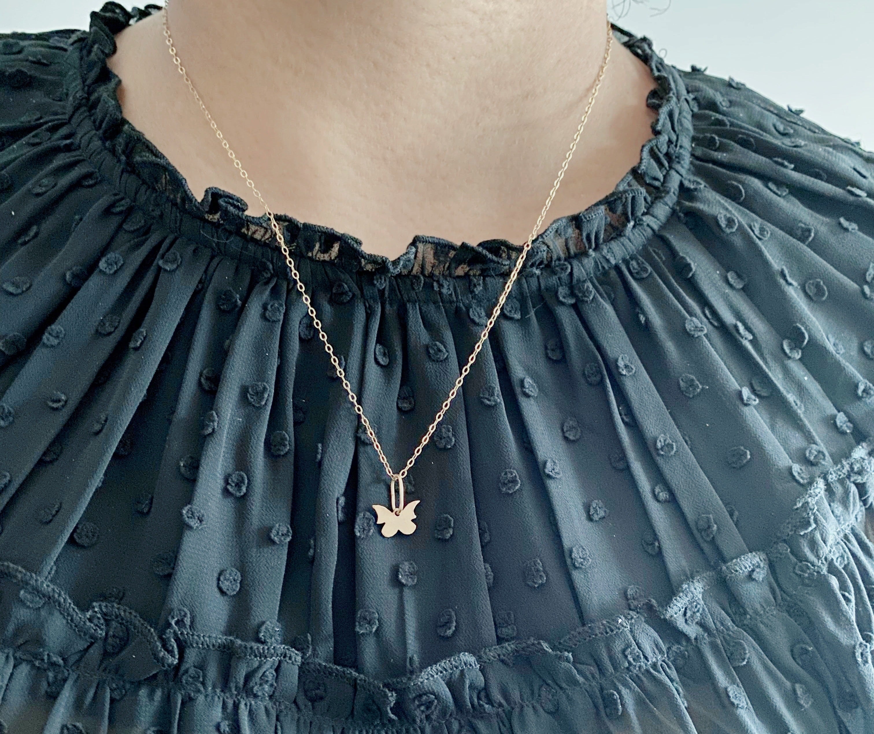 dainty gold butterfly necklace front dream awake