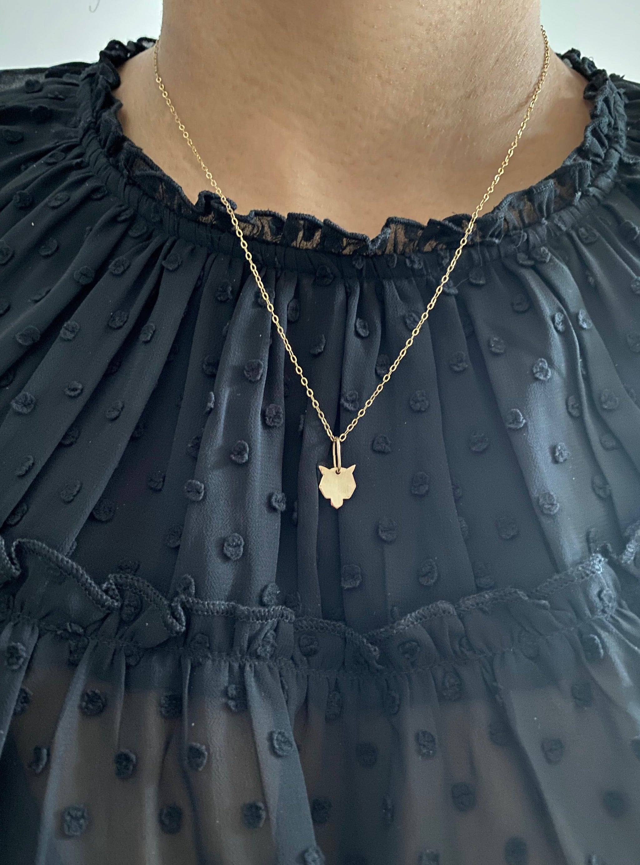 lone wolf necklace hanging