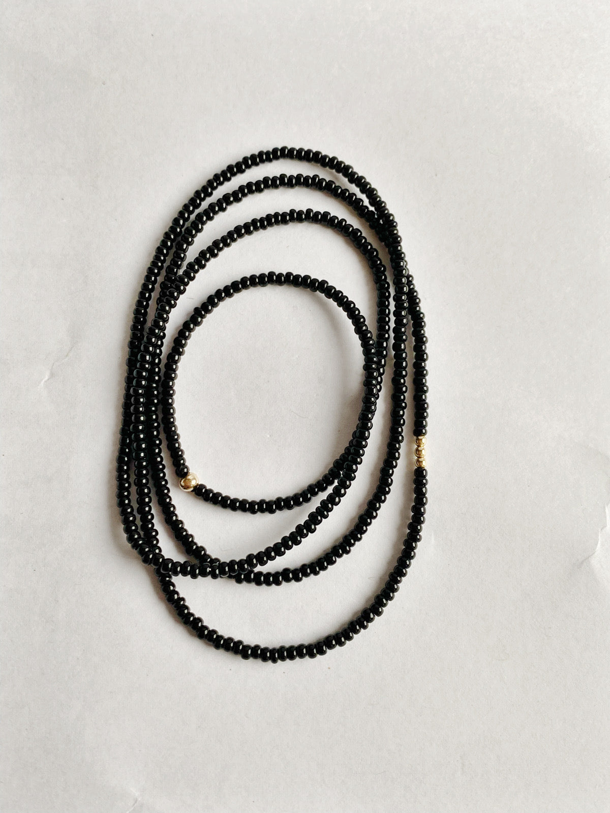 evening stars long black and gold beaded necklace - andJules Jewelry