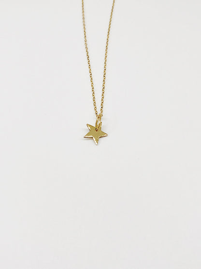 dainty gold star necklace front dreamweaver