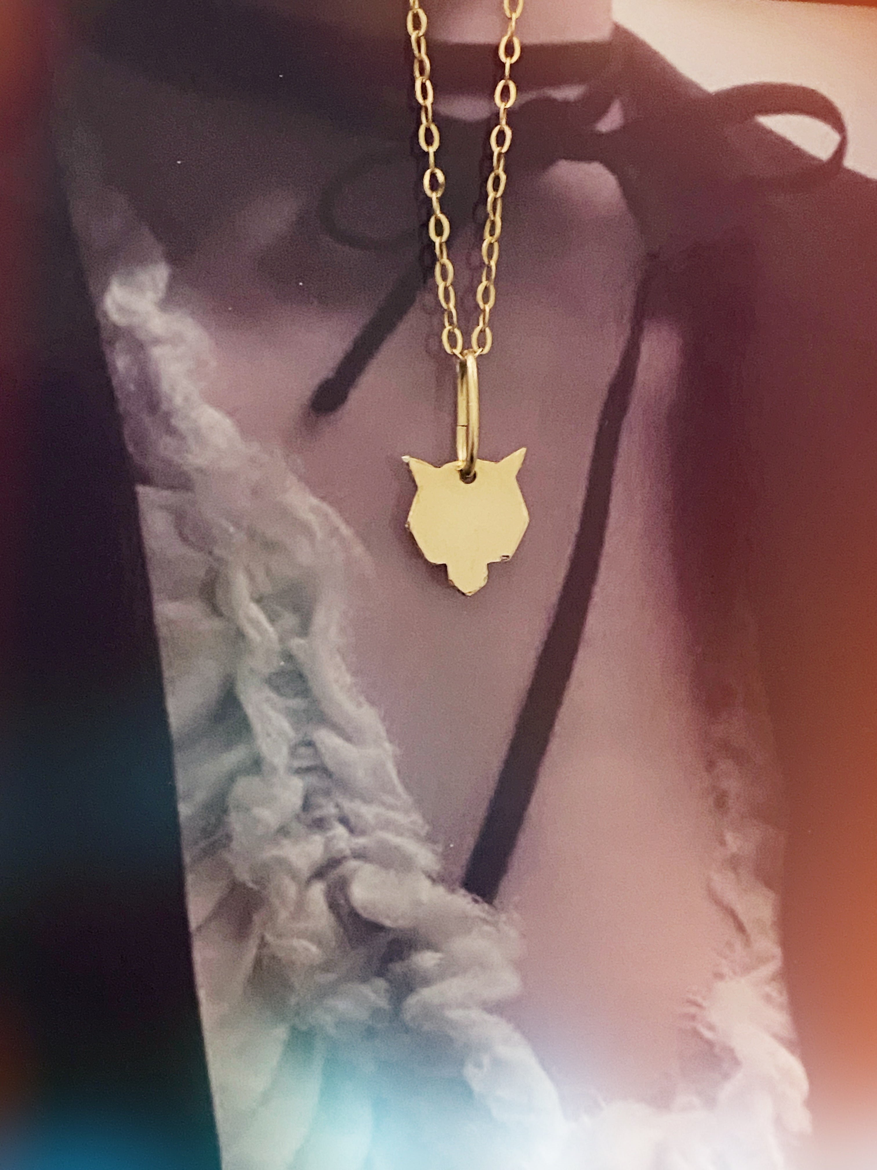 gold lone wolf necklace andJules refined jewelry 