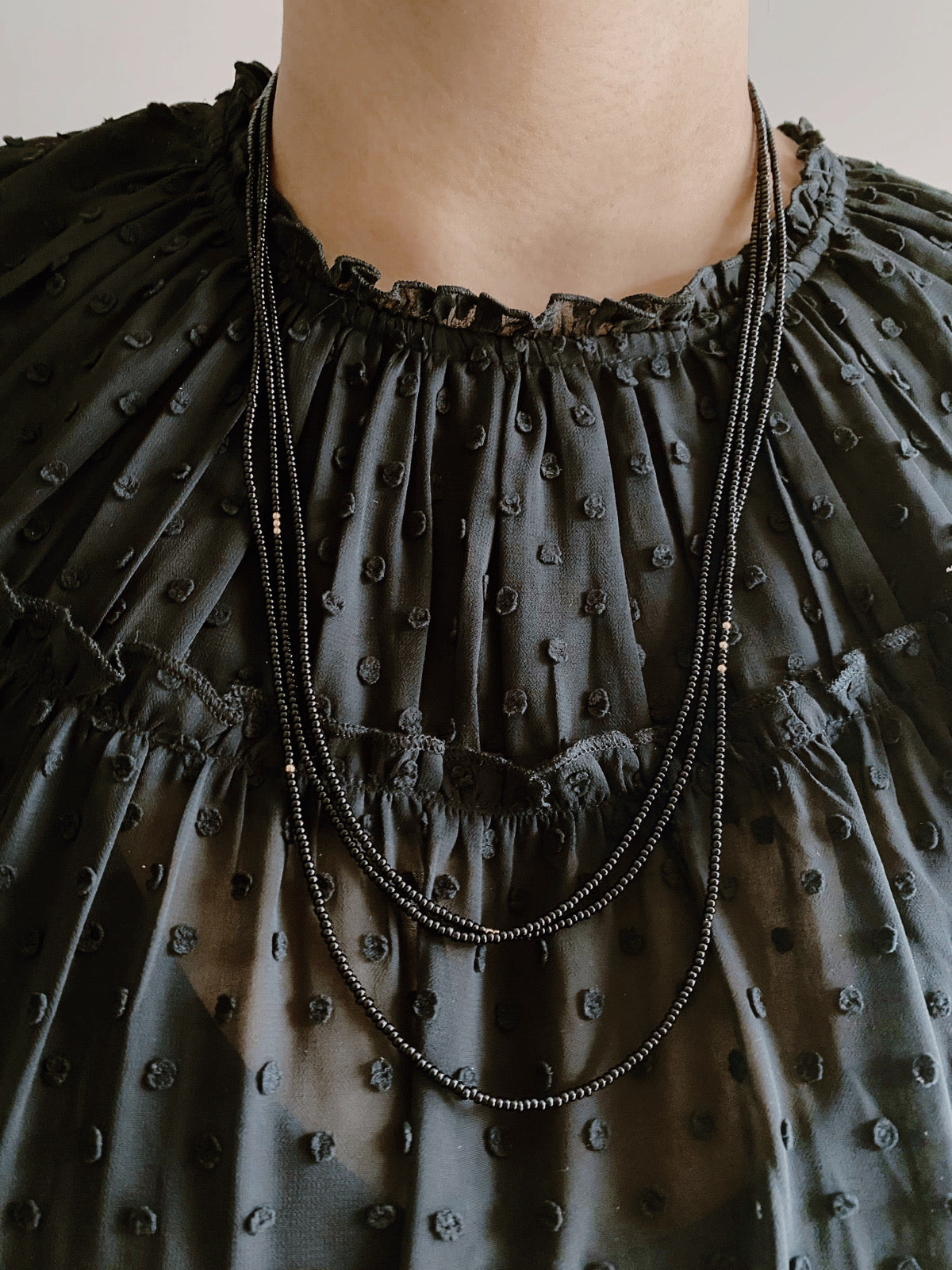 evening stars long black and gold beaded necklace - andJules Jewelry